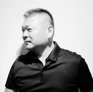 上田 哲也さんの元記事に掲載されたプロフィール写真